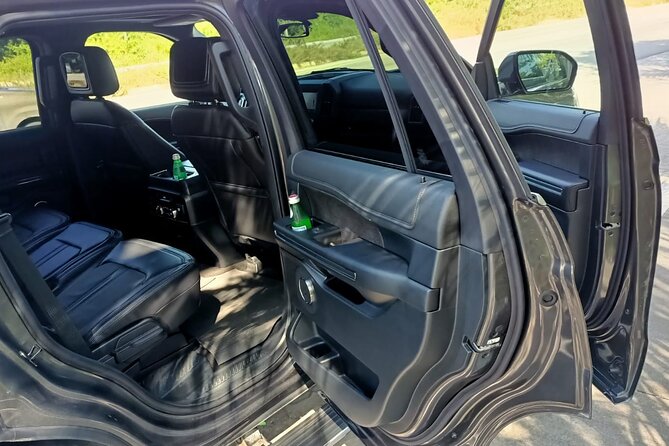 Private Transportation Deluxe Van - The drive details: luggage help, English service, and that first vacation hour