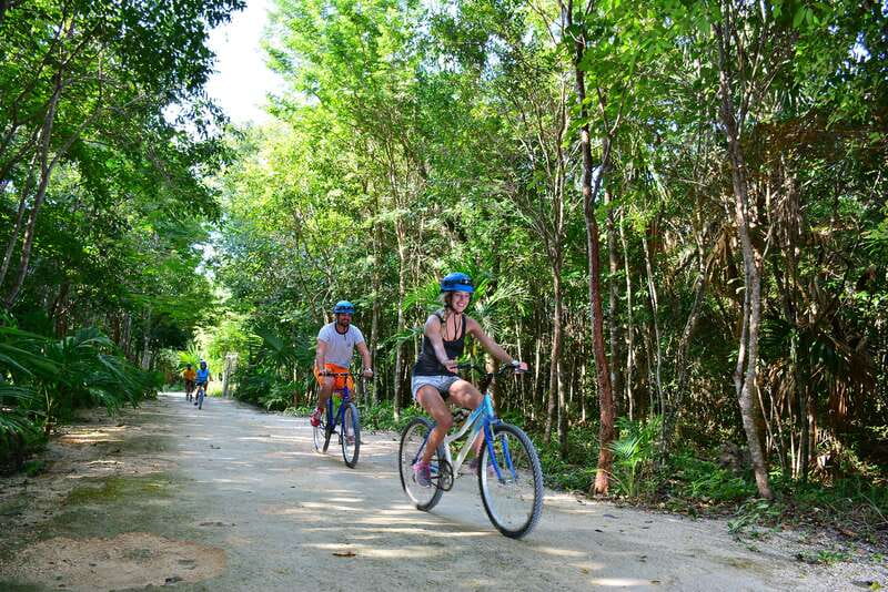 Rio Secreto Nature Reserve: Bicycle, Rappel & Ziplines Tour - Entering Rio Secreto: cave walking next to the underground river