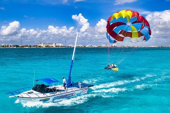 Sky Rider Oceanside Parasailing Experience in Cancun - Boarding the Boat and the Ascent to 325 Feet