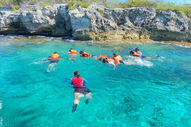 Snorkeling in Isla Mujeres and Underwater Museum - Beach club and Tikinxic roast fish: the best kind of payoff