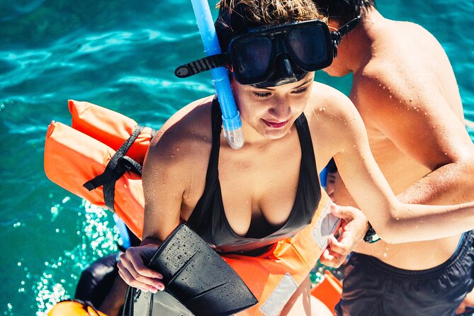 The Best Catamaran tour to Isla Mujeres with Open Bar and Lunch - Snorkeling at the Caribbean Reef: Short Window, Smart Prep