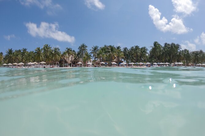 The Best Catamaran tour to Isla Mujeres with Open Bar and Lunch - How the Timing and Group Size Affect Your Day