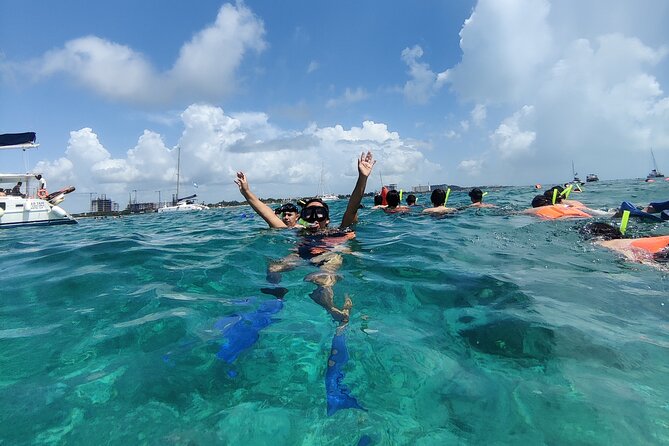 Top Isla Mujeres Catamaran Tour with Snorkel Open Bar and Buffet lunch - Money Check: Open Bar, Buffet Lunch, and the 800 MXN Fee