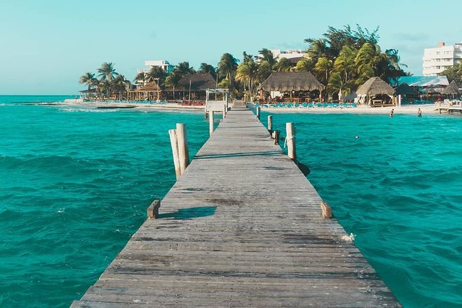 Tour in a Catamaran to Isla Mujeres with all included for the best price! - The crew vibe on a 60-person catamaran