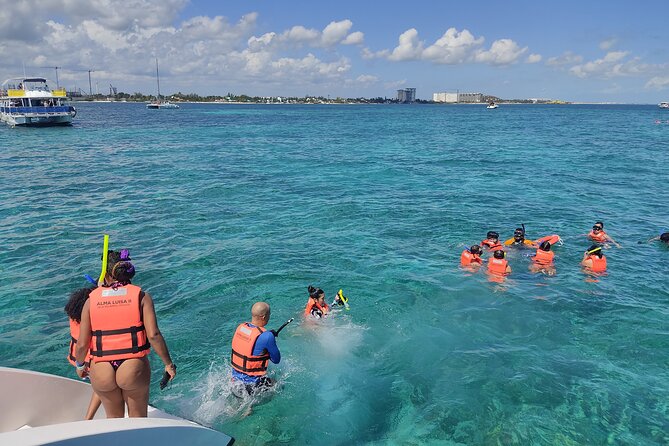 Trip to Isla Mujeres - Catamaran Unlimited Adventure from Playa del Carmen - On-water start: Punta Sam, breakfast, then your first snorkel