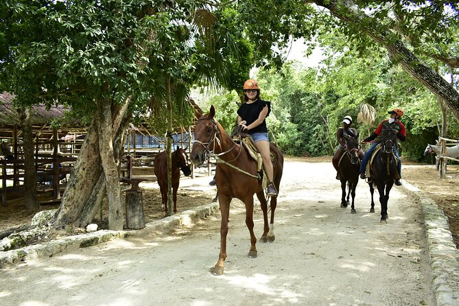 Wonderful Jungle Experience with Horse Riding, ATV, Ziplines and Cenote - Zipline over the trees: short flight time, big adrenaline payoff