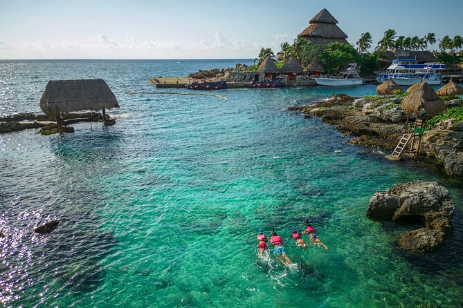 Xcaret Park Day Trip, transportation and Cultural Night Show - Getting There From Cancun: Pickup, Wristbands, and Timing