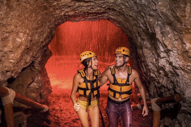Xplor Fuego with Buffet Style Dinner and transportation - Cave rafting and underground swimming: the otherworldly core