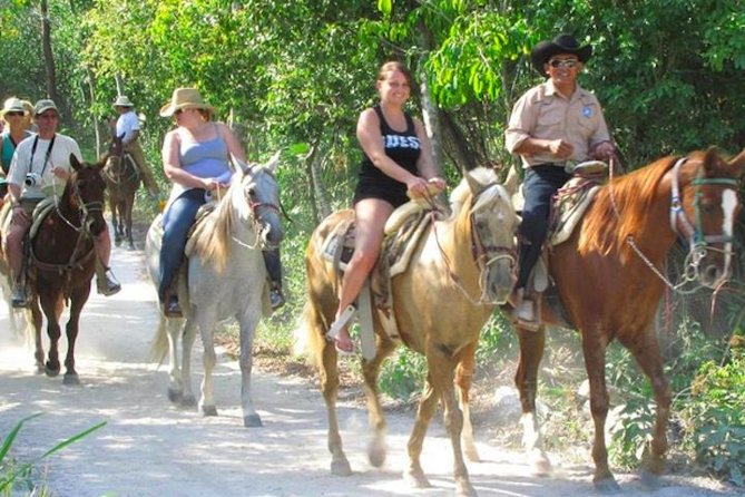 Ziplining and Horseback Riding Experience from Cancun and Playa del Carmen - Cenote break: cooling off in natural water
